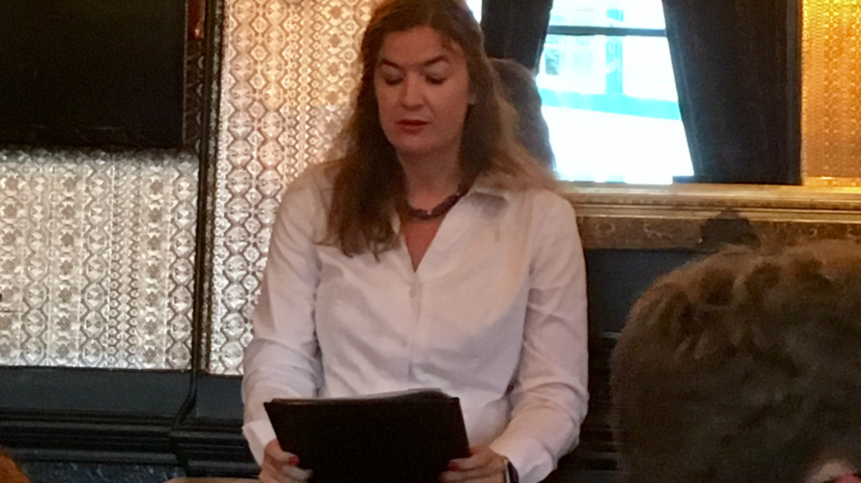 Franziska reading an excerpt from her novel to audience