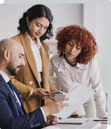 Multi-Disciplinary Team of Seasoned Attorneys Analyzing a Document