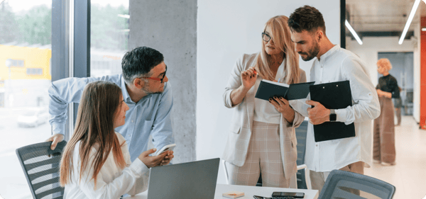 A group of lawyers working together to train an AI model.