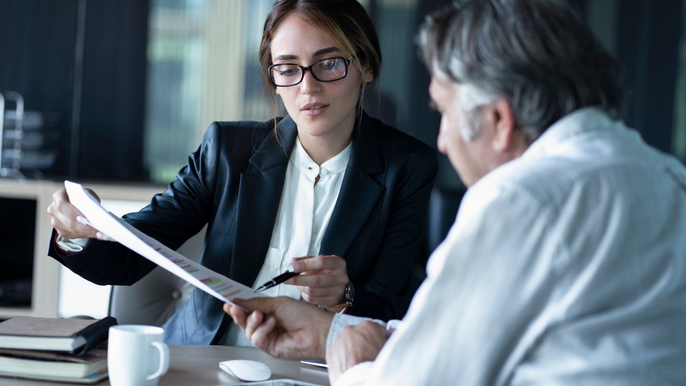 Business attorneys working with client